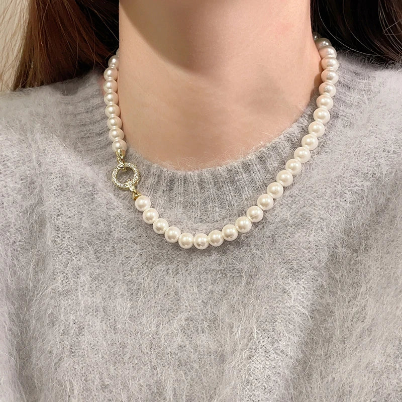 Collar con cierre de anilla y perlas