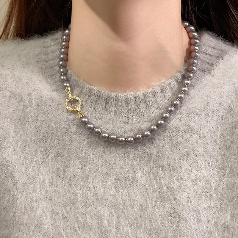 Collar con cierre de anilla y perlas