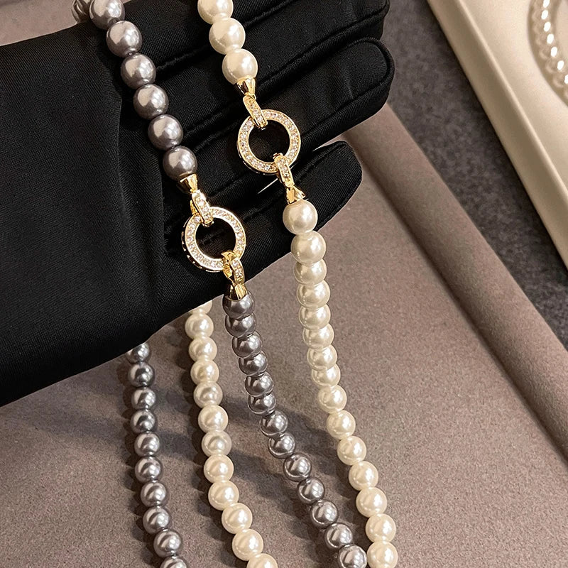 Collar con cierre de anilla y perlas