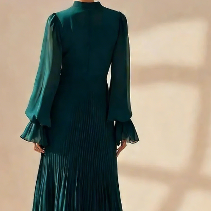 Elegante vestido plisado con volantes